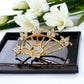 earring on top of a glass display ixxia